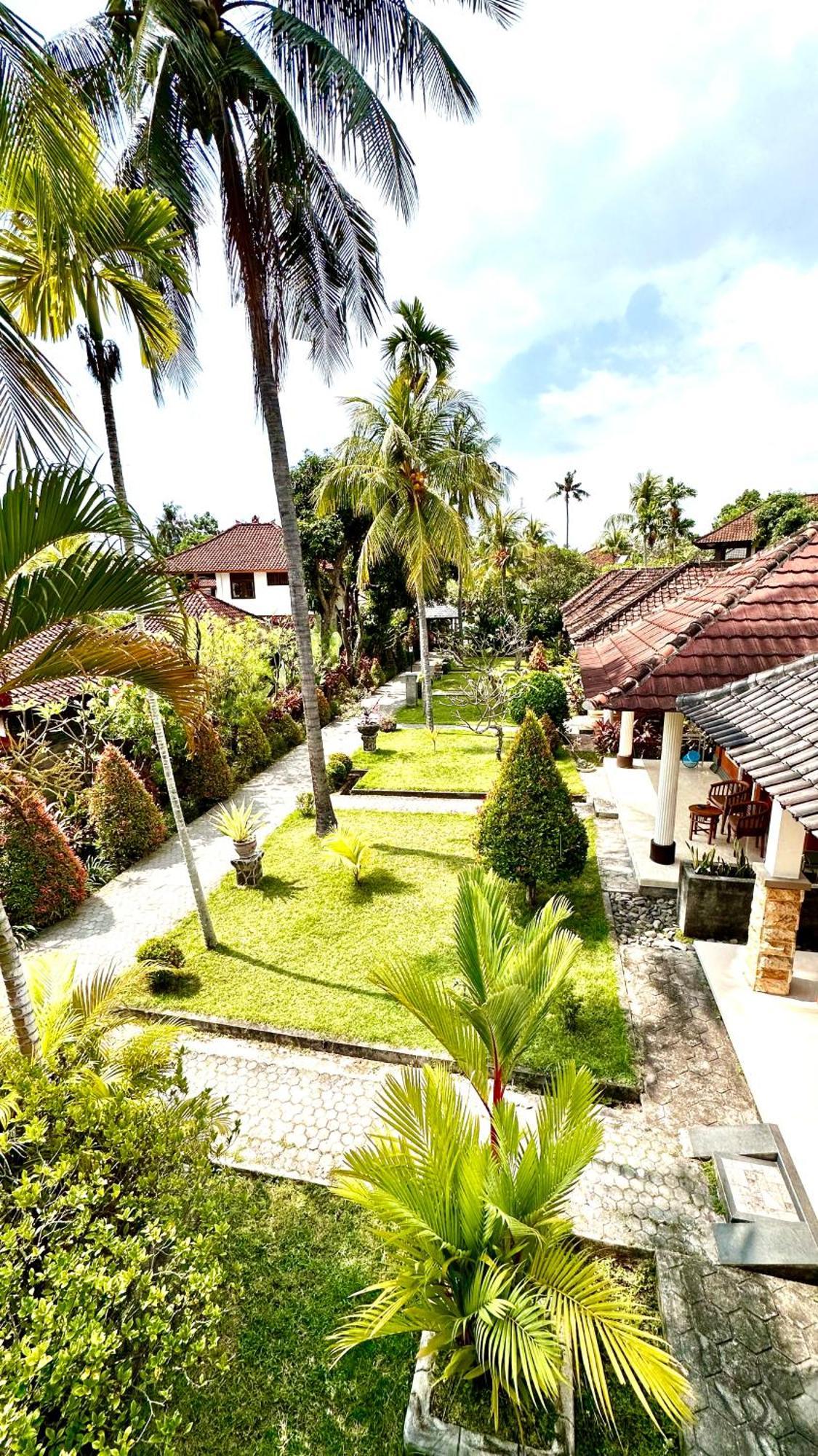 Puri Bali Hotel Lovina Beach Extérieur photo